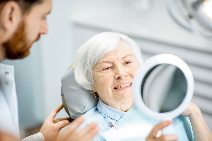 Facilidades de pago y seguros dentales para prótesis dentales con Sanident